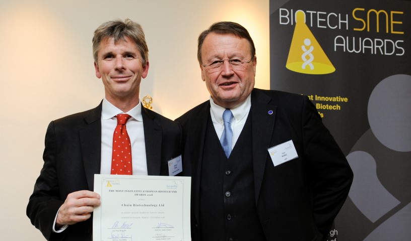 Dr Edward Green (left) receives award from Paul Rübig MEP